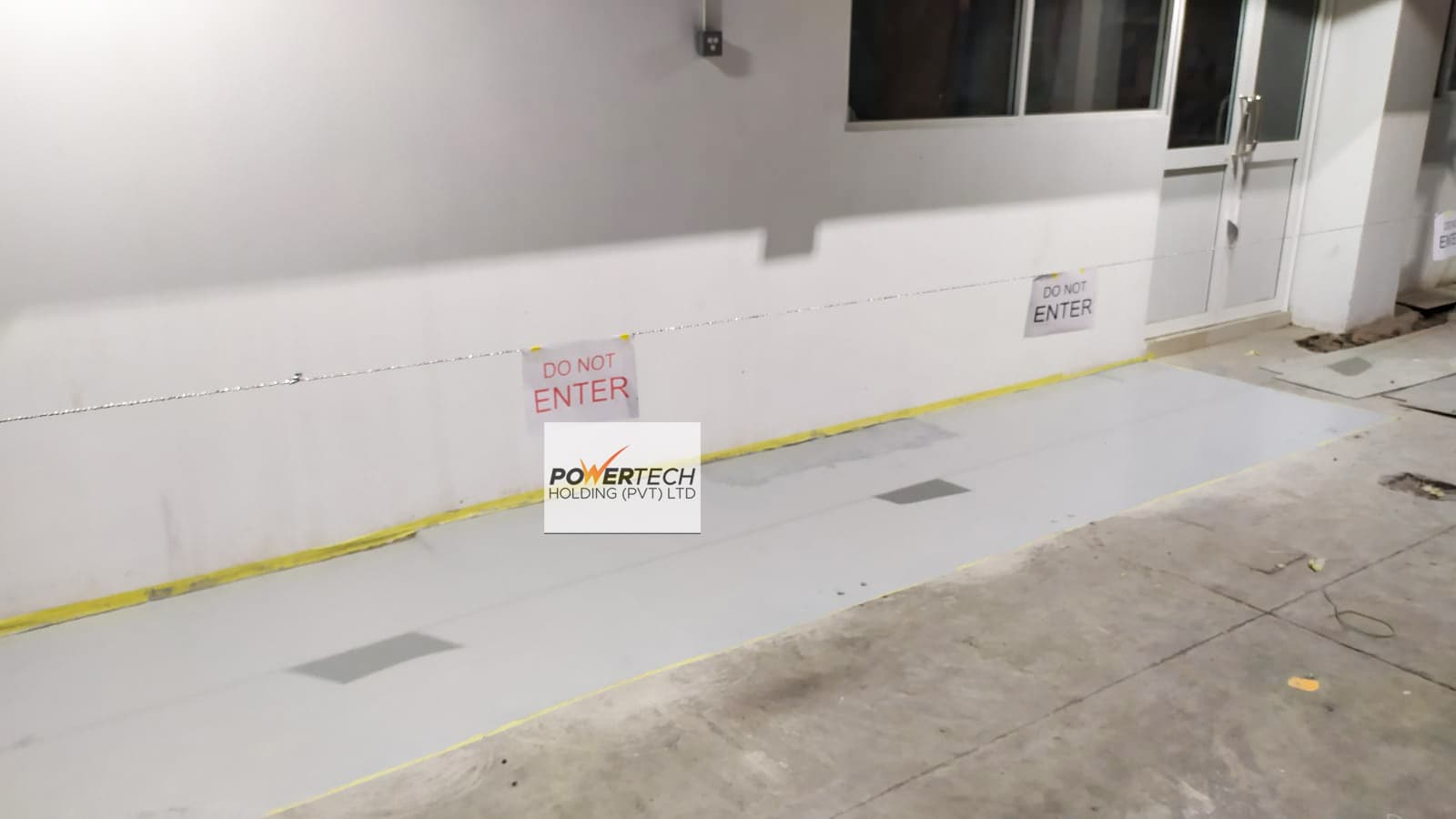 epoxy flake floor with helicopter in storage