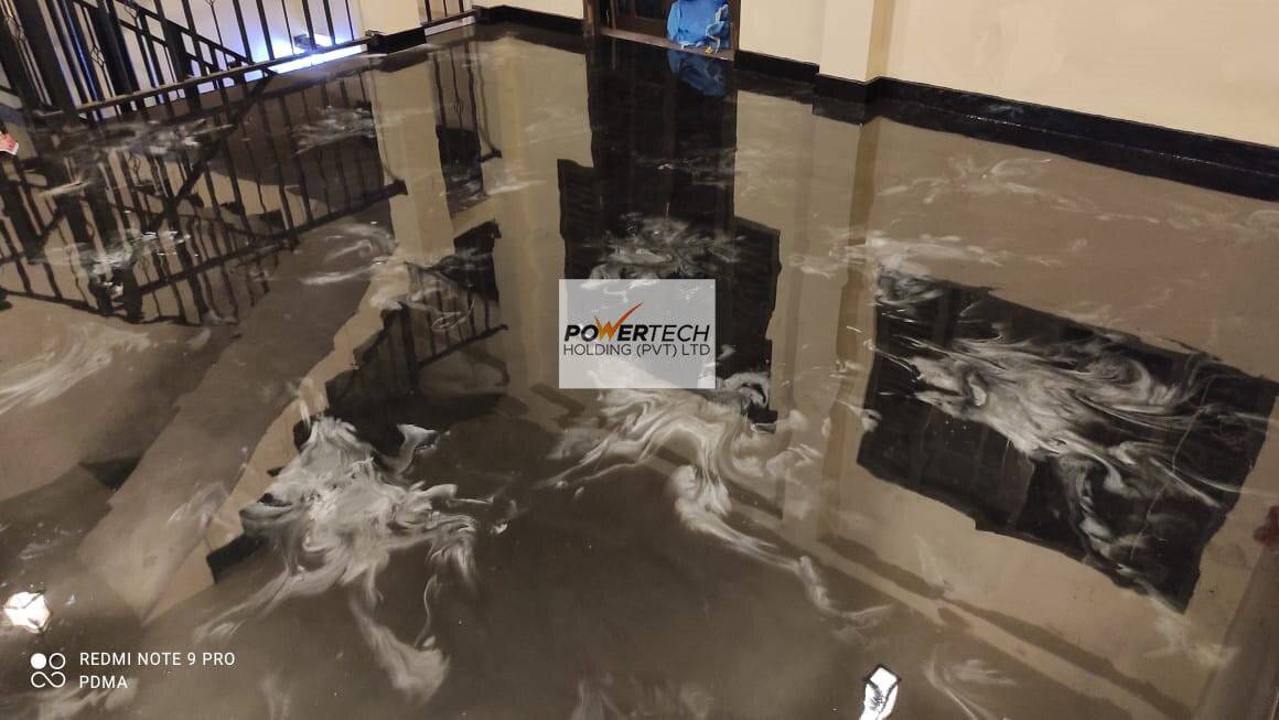 epoxy flake floor with helicopter in storage