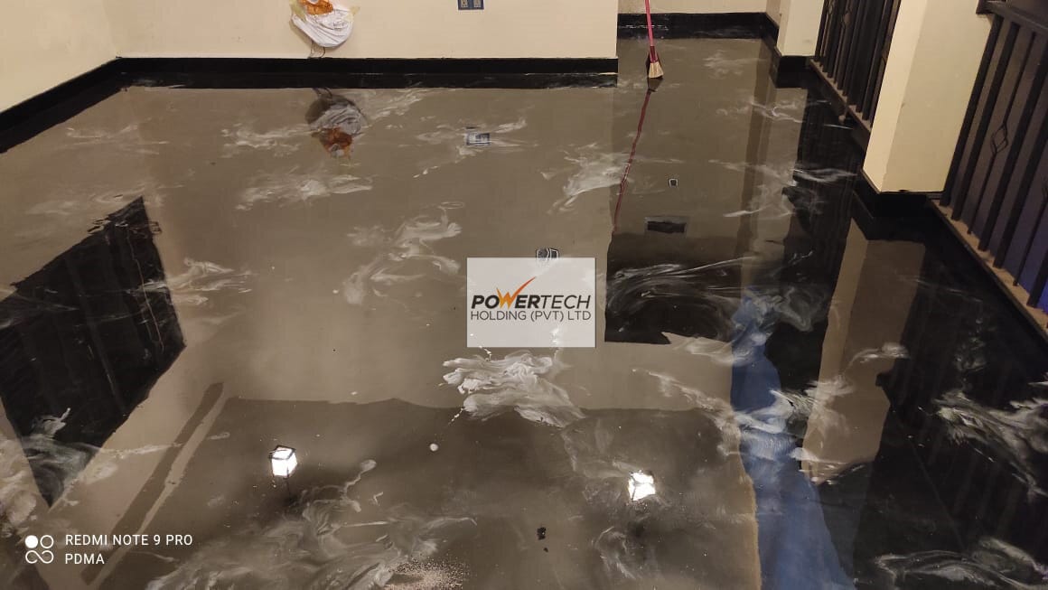 epoxy flake floor with helicopter in storage