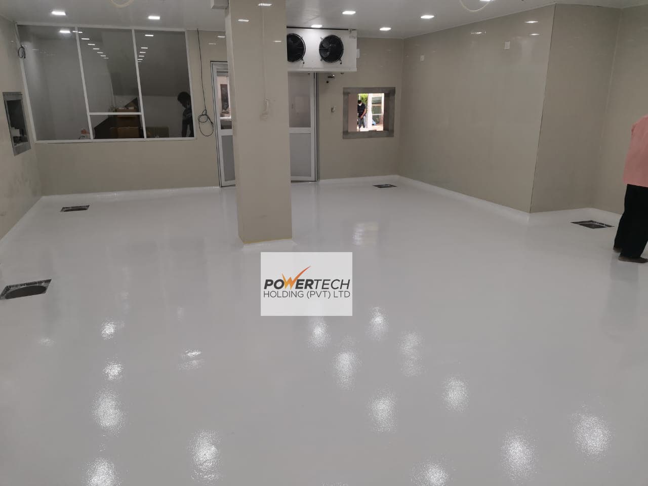 epoxy flake floor with helicopter in storage