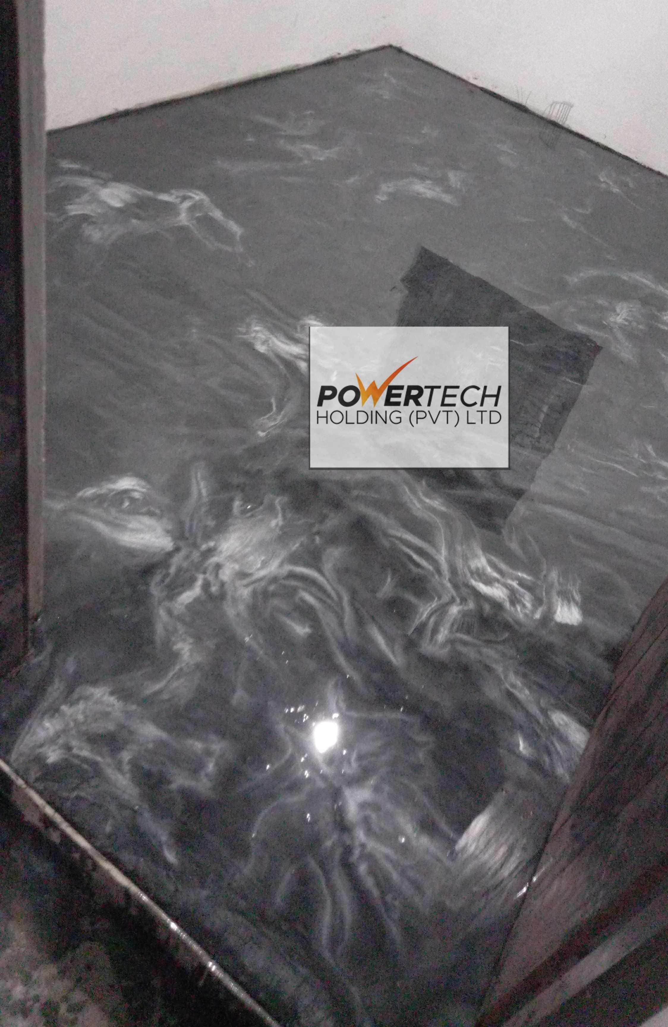 epoxy flake floor with helicopter in storage