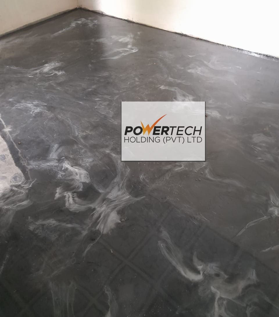 epoxy flake floor with helicopter in storage