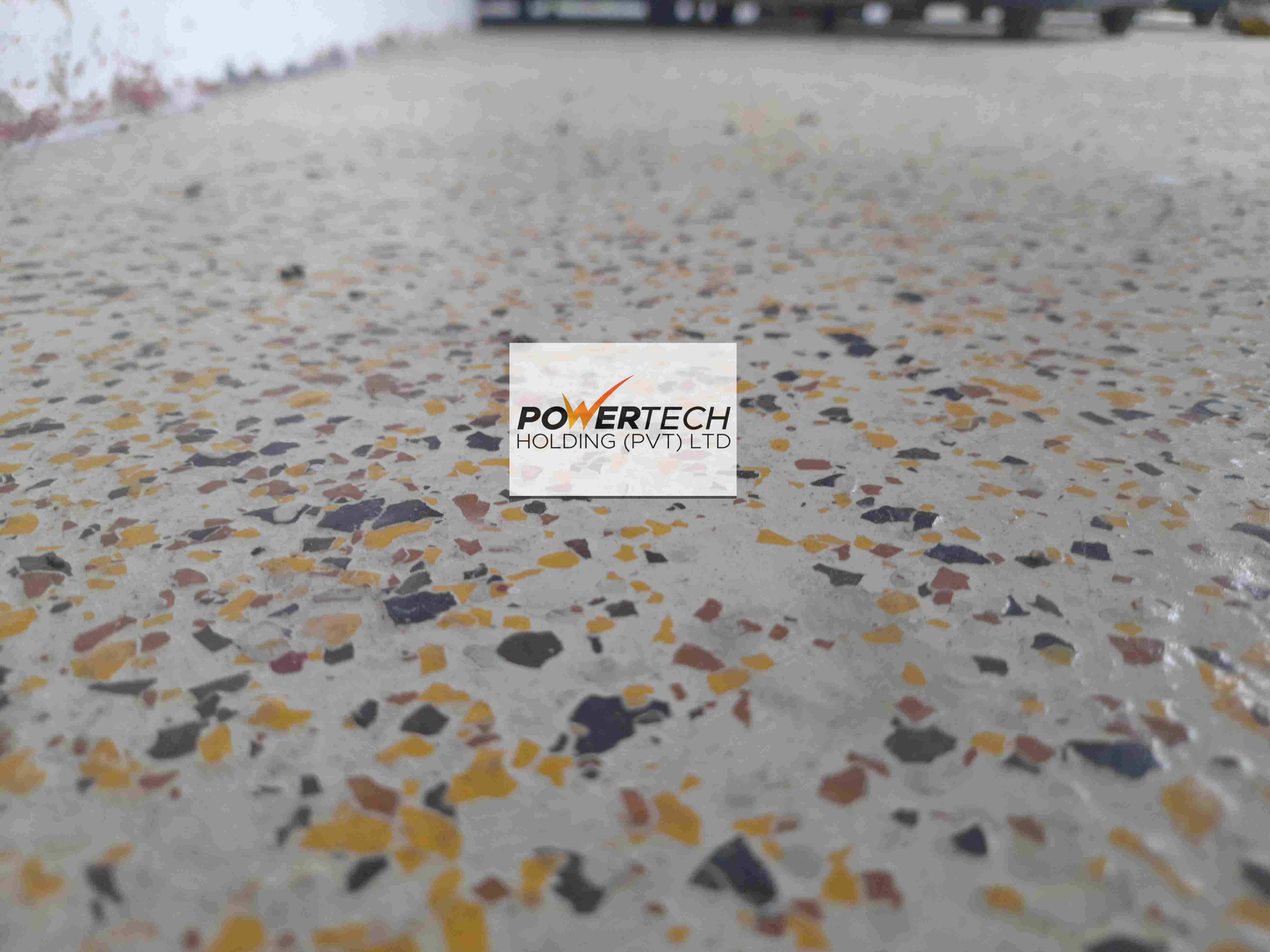 epoxy flake floor with helicopter in storage