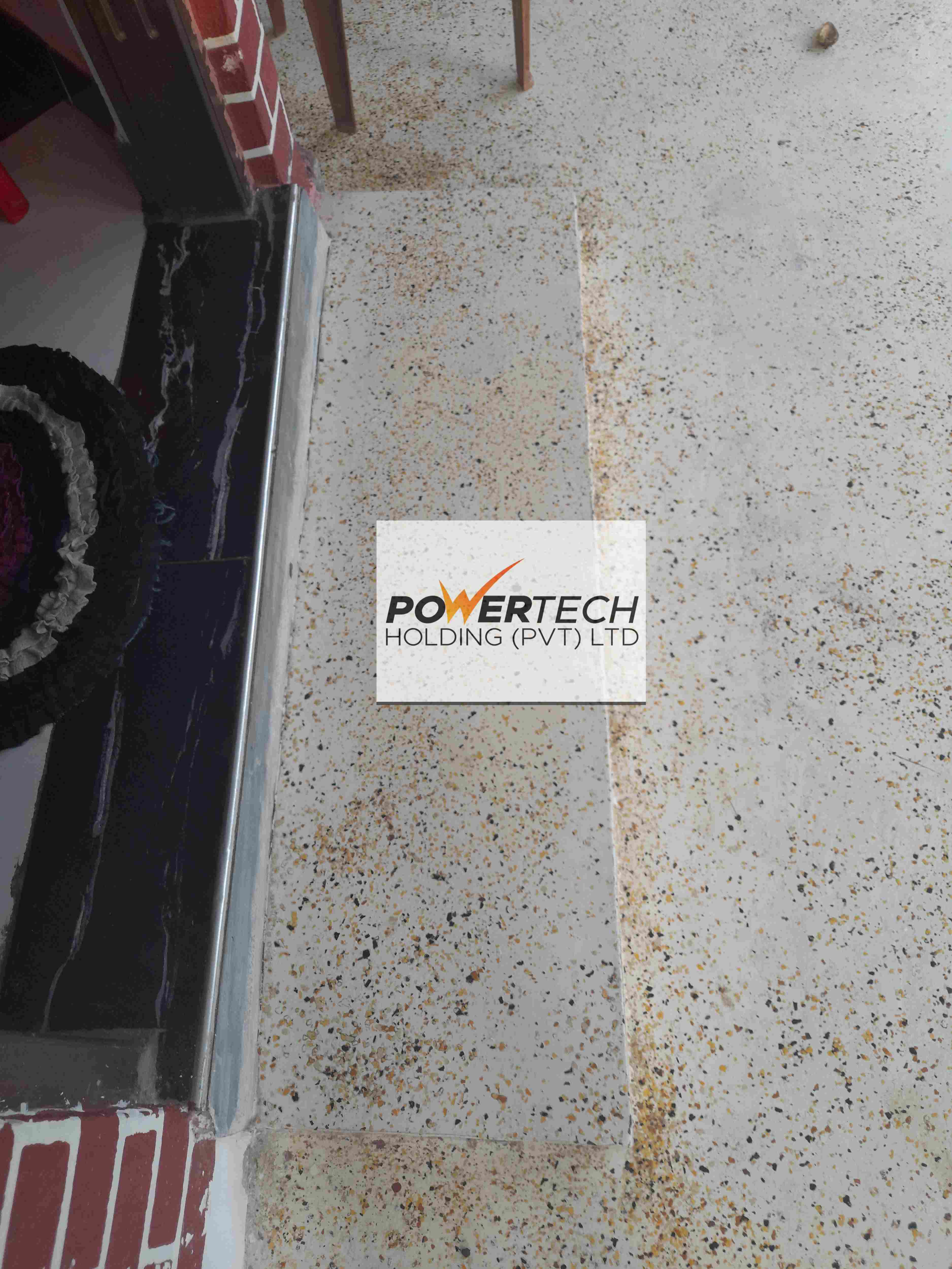 epoxy flake floor with helicopter in storage