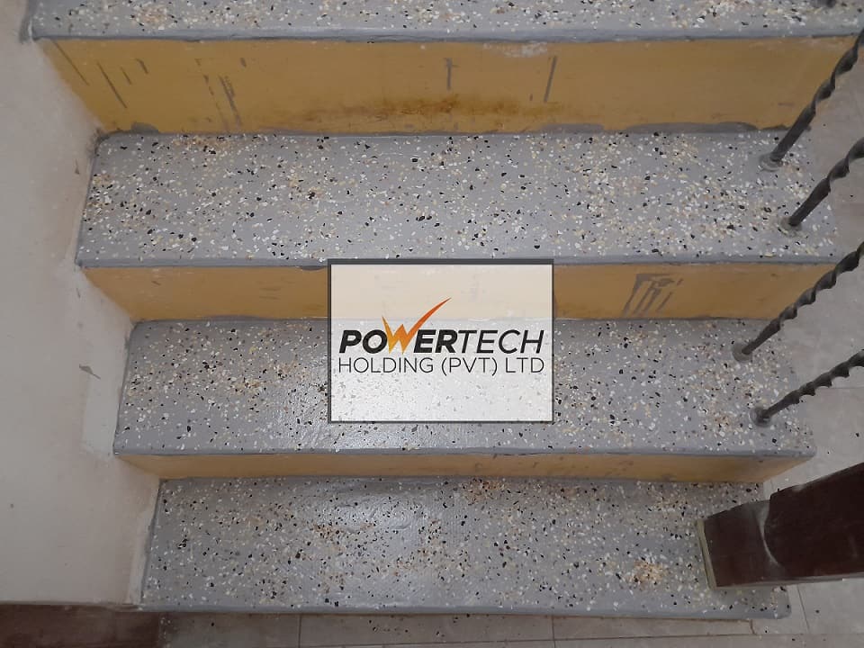 epoxy flake floor with helicopter in storage