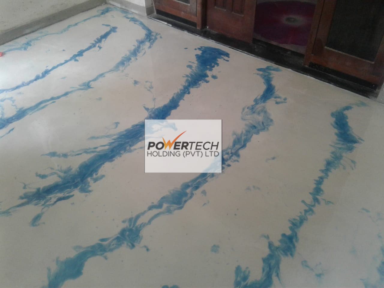 epoxy flake floor with helicopter in storage