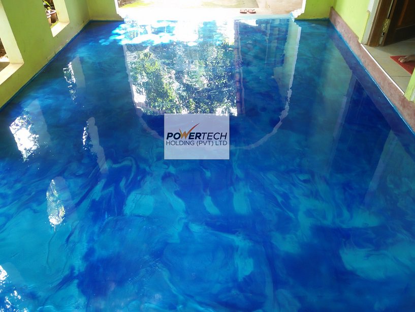 epoxy flake floor with helicopter in storage