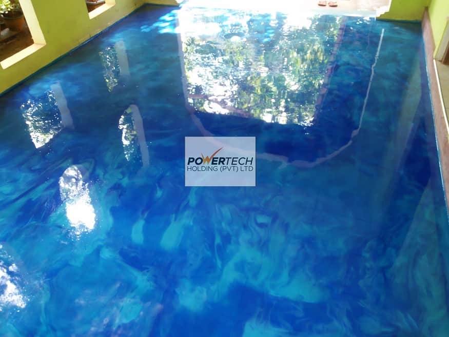 epoxy flake floor with helicopter in storage